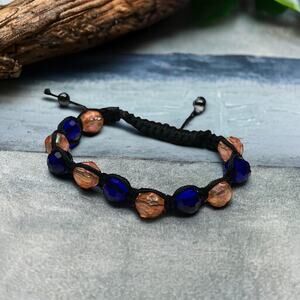Blue and Peach Beaded Bracelet on Black - Unique and Stylish Design